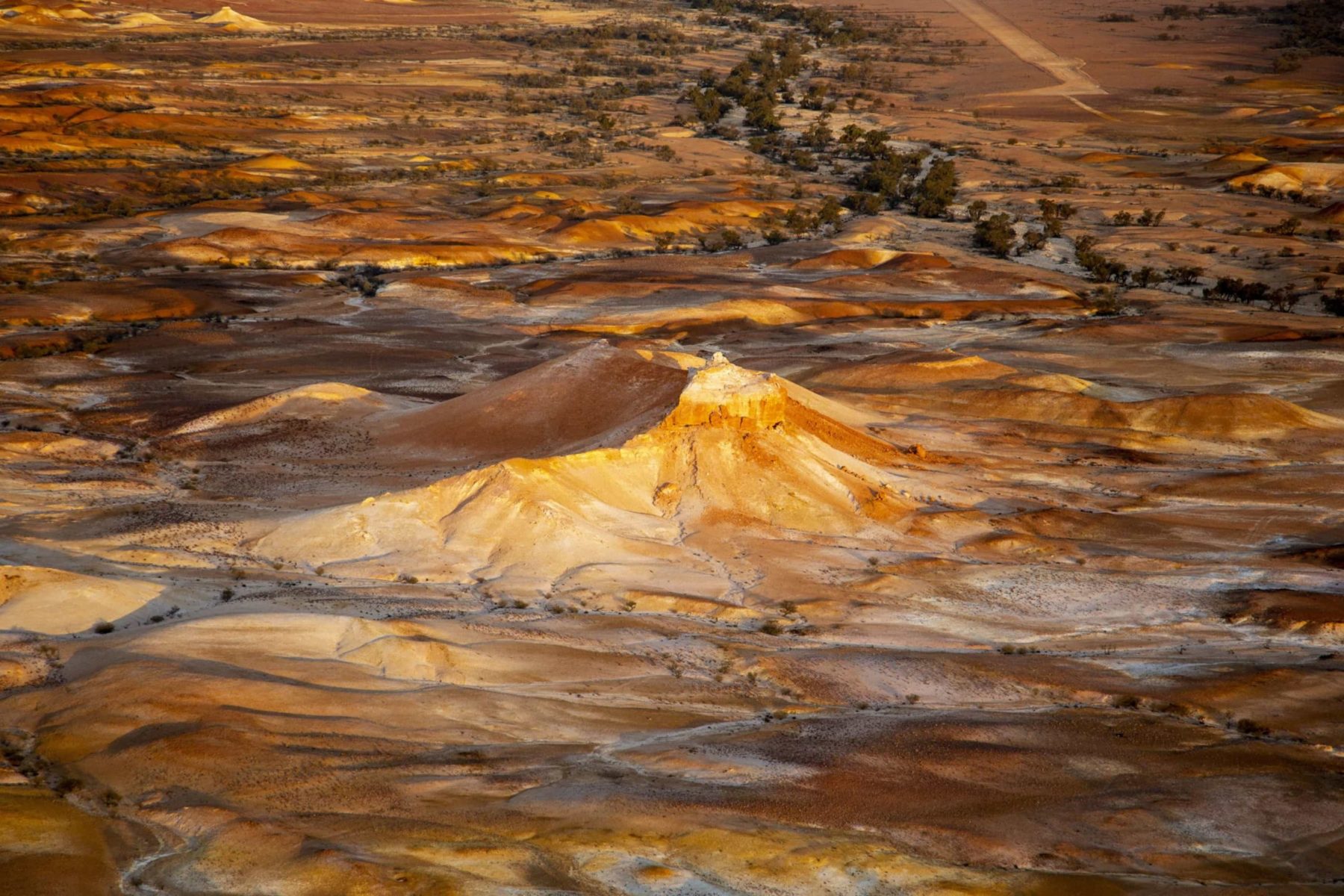The colours of the Painted Hills are the result of oxidised iron and sulfur leaching through the weathering sandstone.