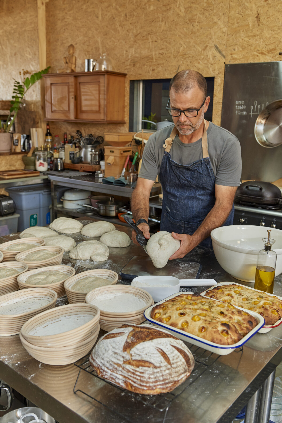 Chef mature man cook wear apron in kitchen. Handsome man preparing food in  kitchen. Guy cooking a tasty meal. Man on kitchen with meat and vegetables  Stock Photo - Alamy