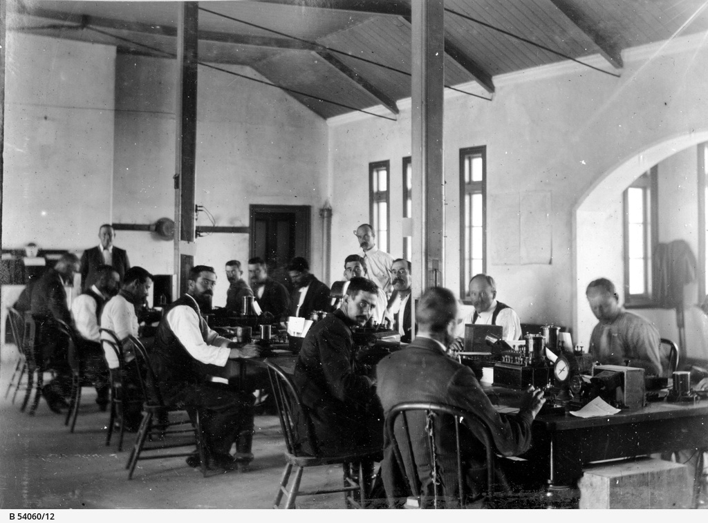 Men working in the Eucla Telegraph Station’s Operating Room.