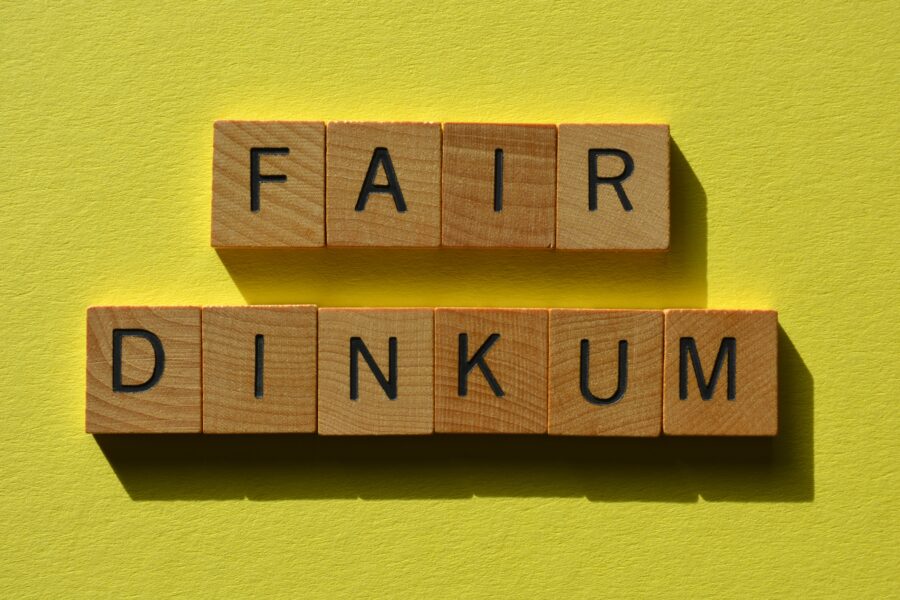 The words 'Fair Dinkum' spelled out with wooden scrabble tiles