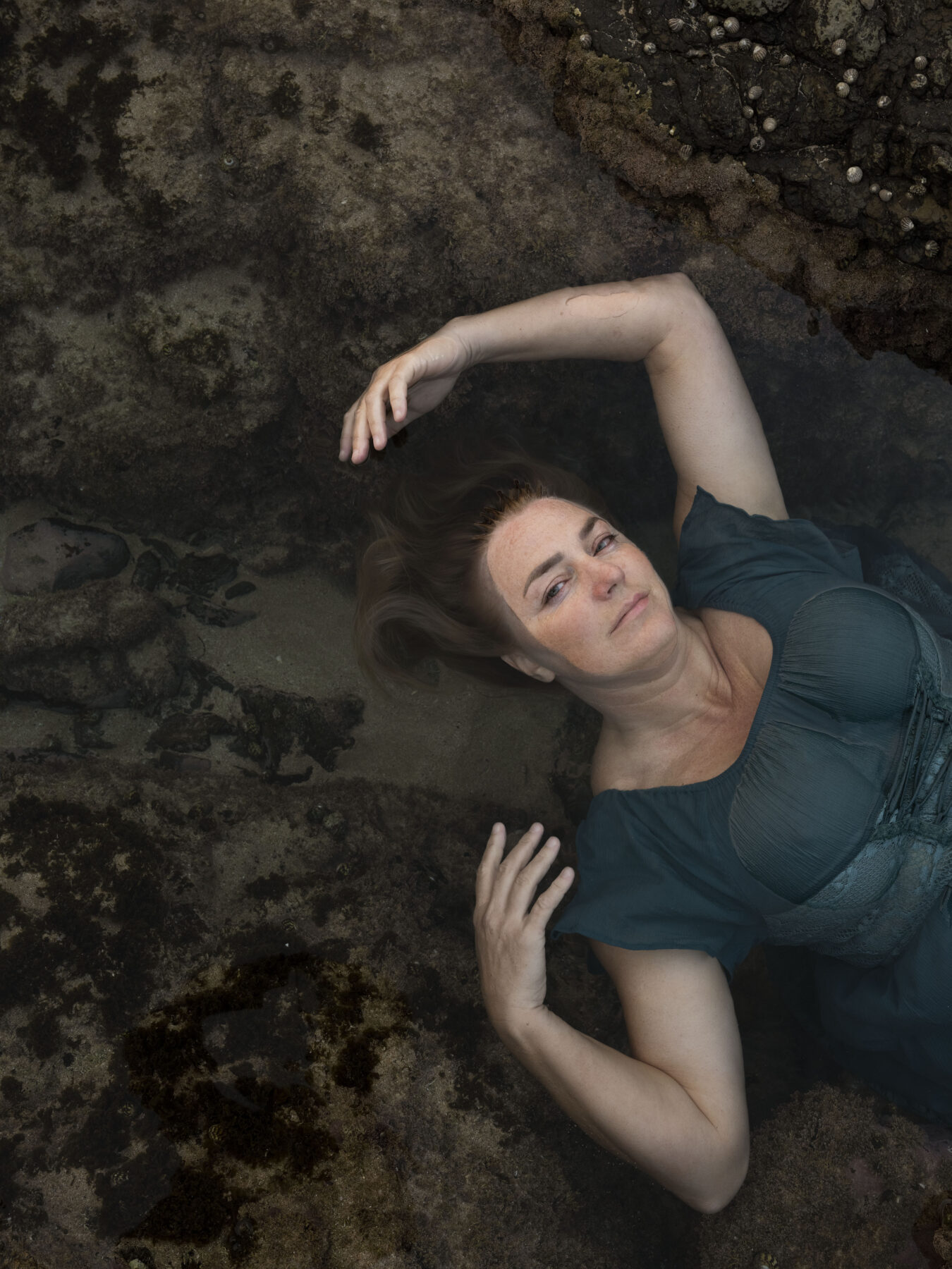 Karina Holden swims in an ocean rock pool.