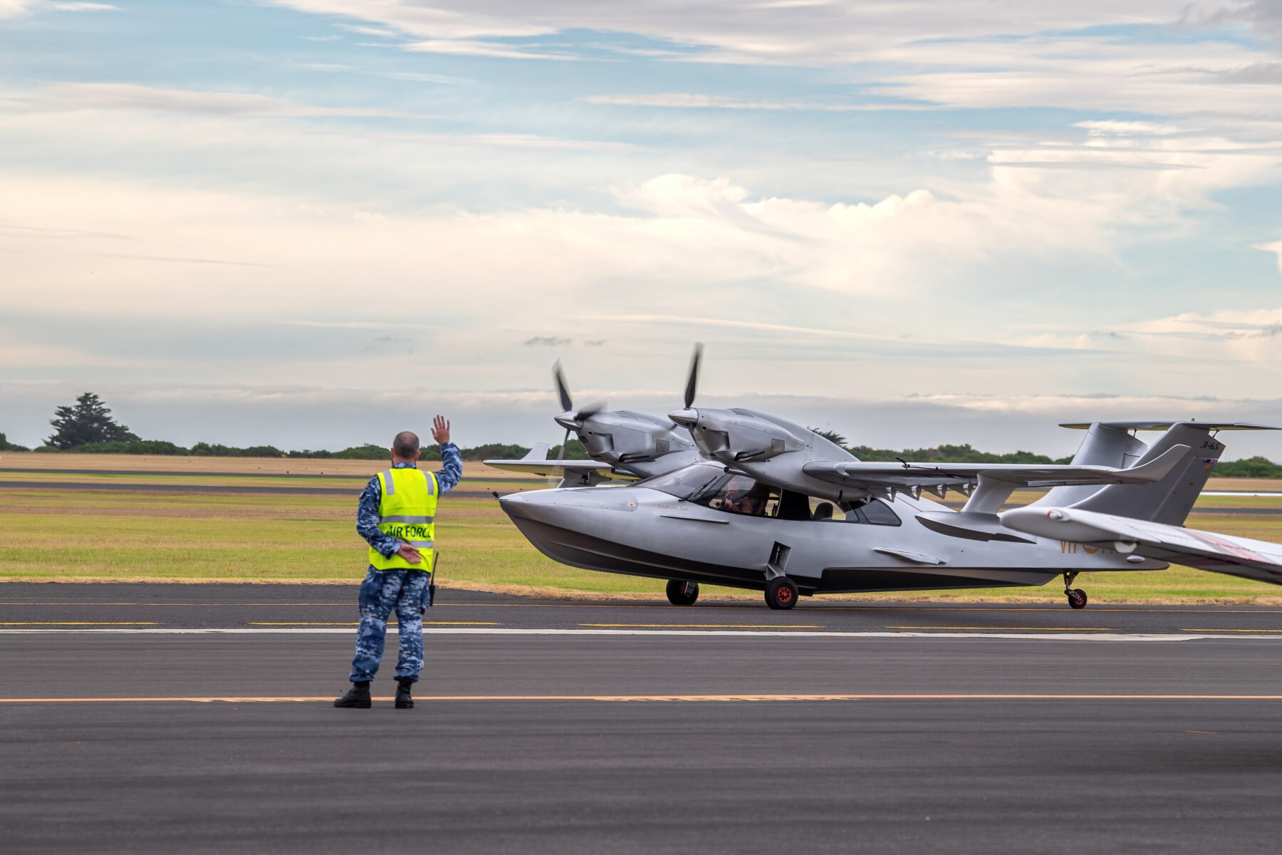 Michael Smith, 2016 Adventurer of the Year is welcomed with a wave by Wing Commander Robert Gill before he leaves to recreate the first circumnavigation of Australia from RAAF Base Point Cook in 1924 in a twin engine modern Chaika LLC L65 Seabear aircraft named Southern Sun. *** Local Caption *** Adventurer, Michael Smith is flying solo around the Australian coastline to
commemorate the 100th anniversary of the first flight around Australia by Air Forces acting Chief of the Air Staff, Wing Commander S.J. (Jimmy) Goble, and pilot, Flying Officer Ivor McIntyre in the original Fairey IIID seaplane A10-3. Starting from the Royal Australian Air Force (RAAF) base
in Point Cook, outside Melbourne in his seaplane SouthernSun twin engine Chaika LLC L65 Seabear.