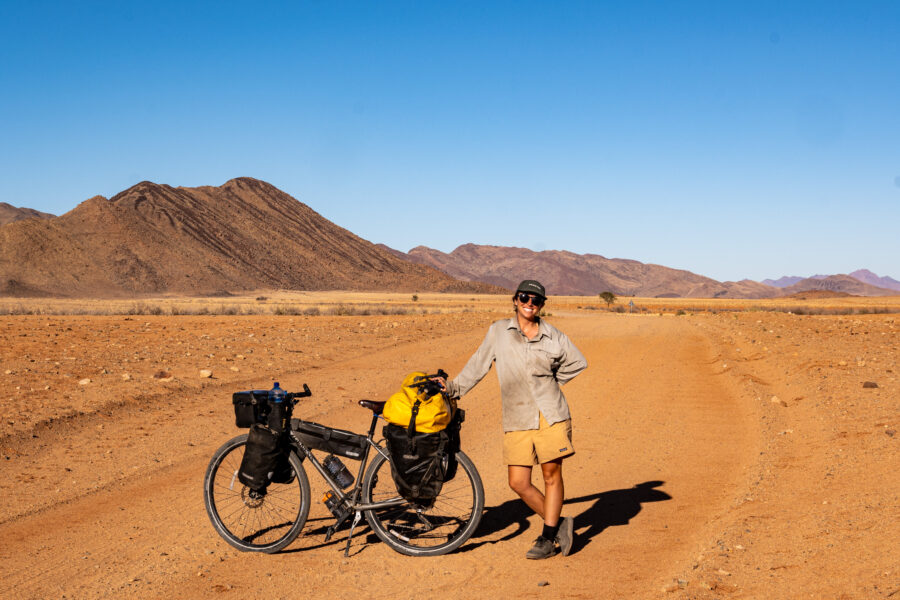 Steph Devery stopping for a photo during her cycle through Saudi Arabia.