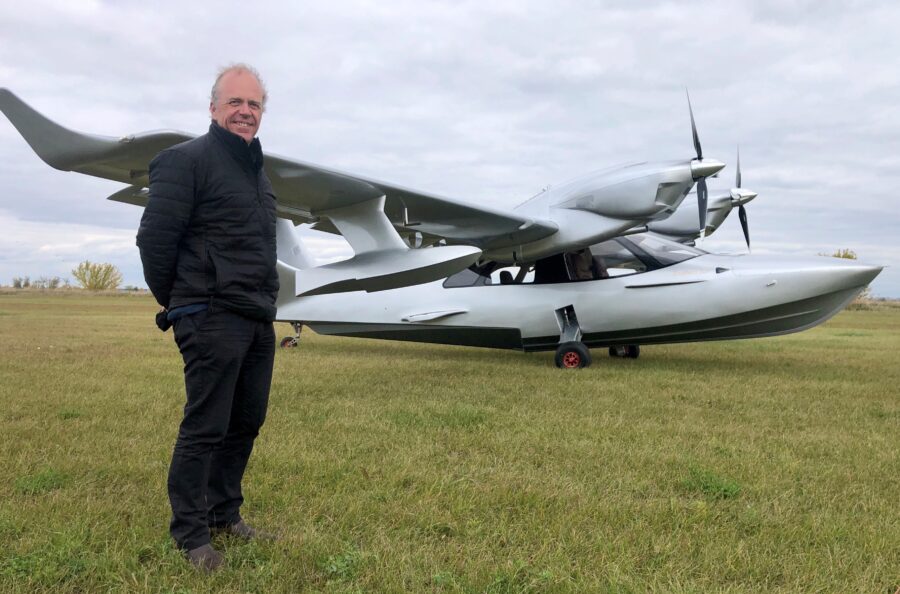 Michael Smith with his plane his custom-built amphibious two-seater, single engine Searey aircraft Southern Sun