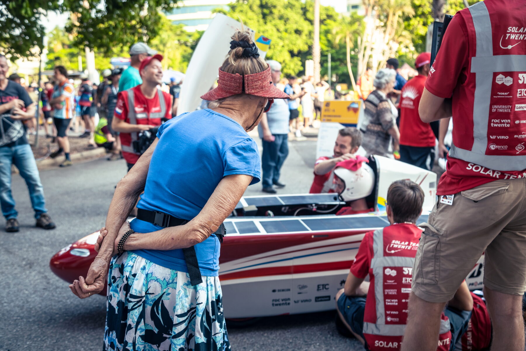 Bystanders marvel at the pre-start action and the solar cars