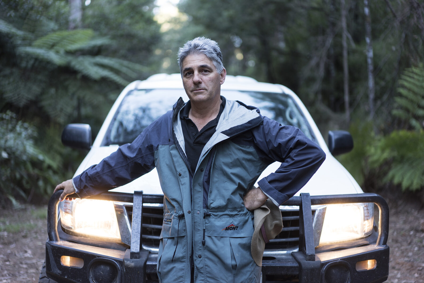 David Lindenmayer standing in an Australian wet forest