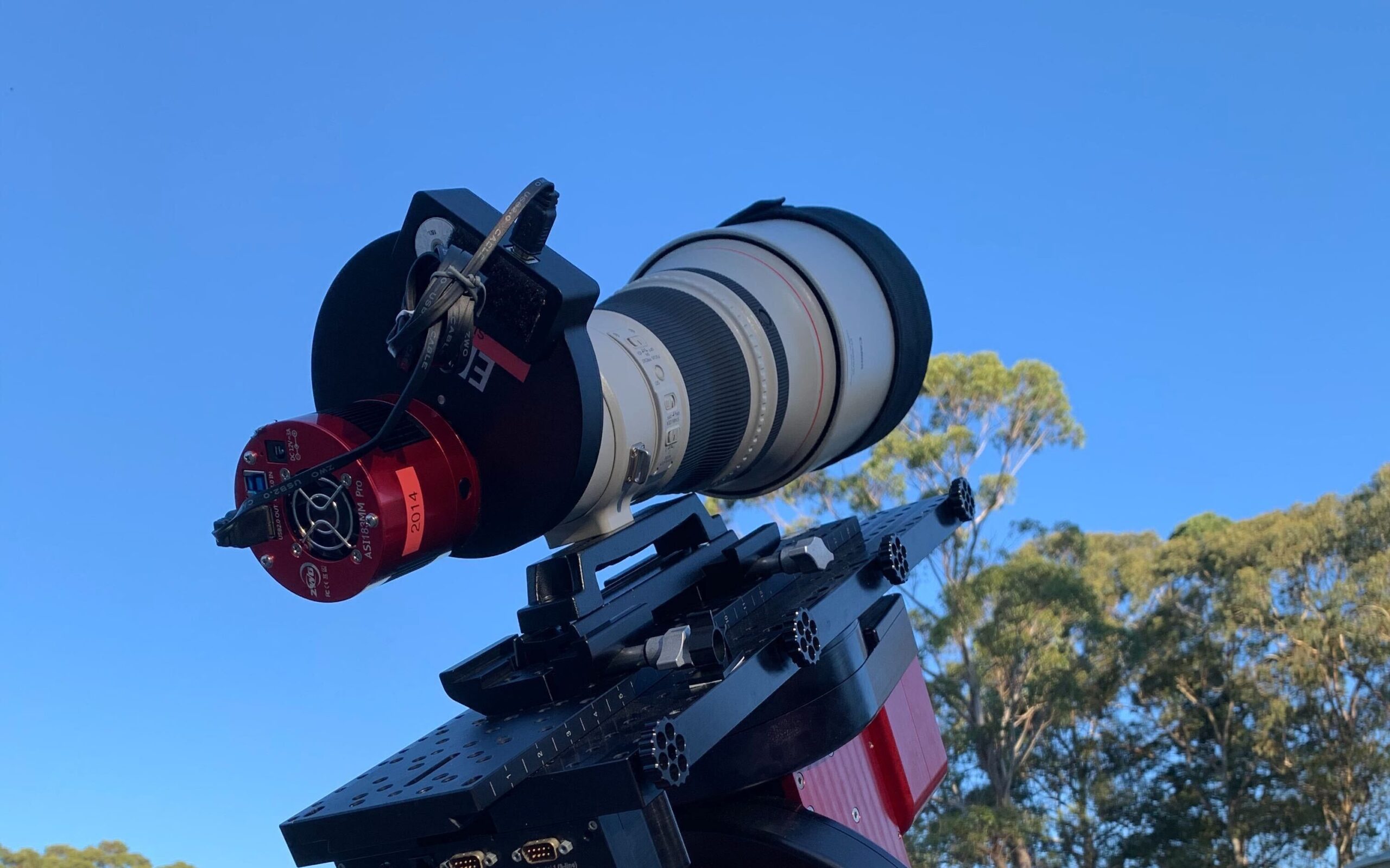This test version, a mini-Huntsman single-lens pathfinder telescope installed at the University’s observatory, allowed the research team to assess various settings in a controlled environment without affecting the Huntsman telescope.