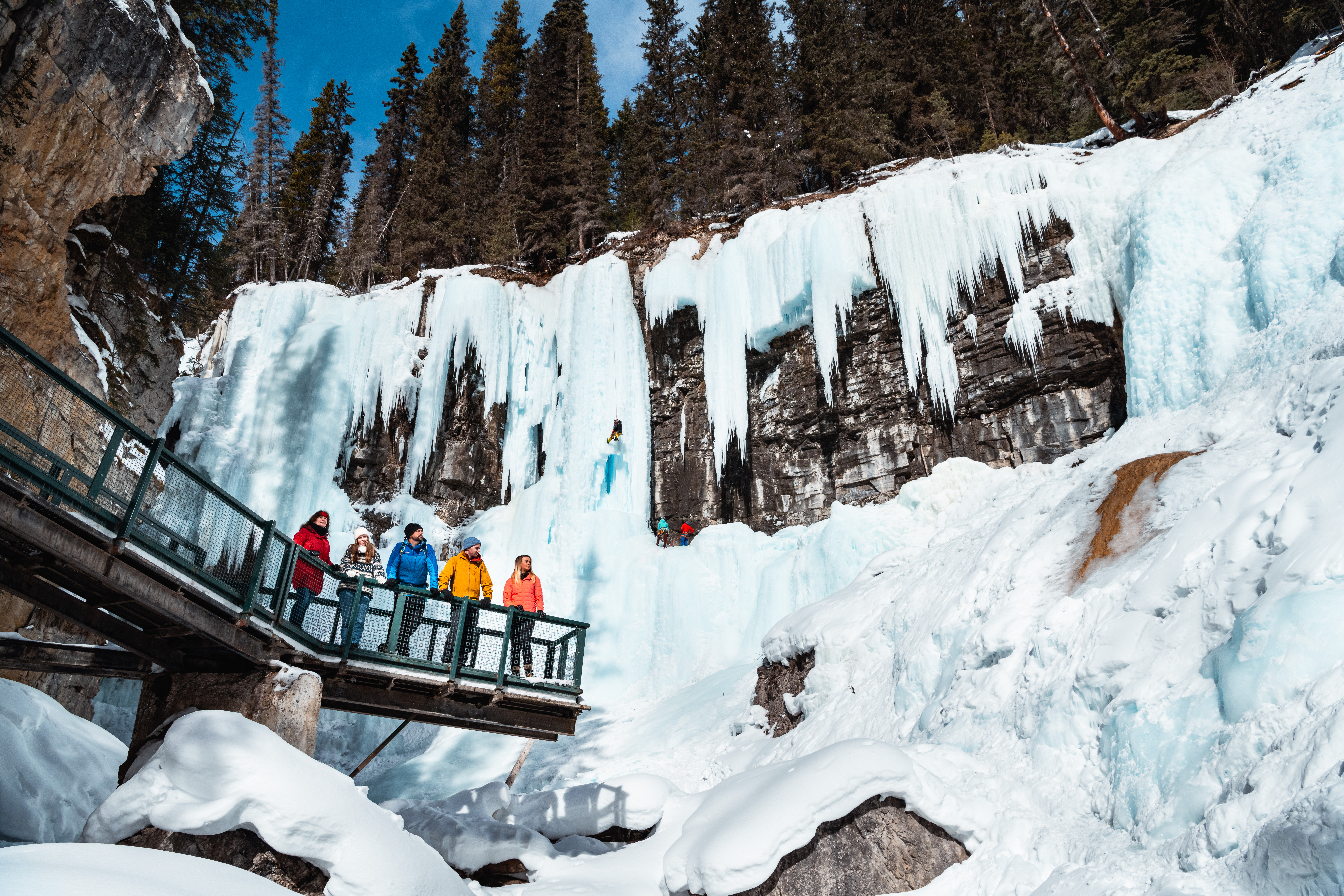 People exploring Johnston Canyon