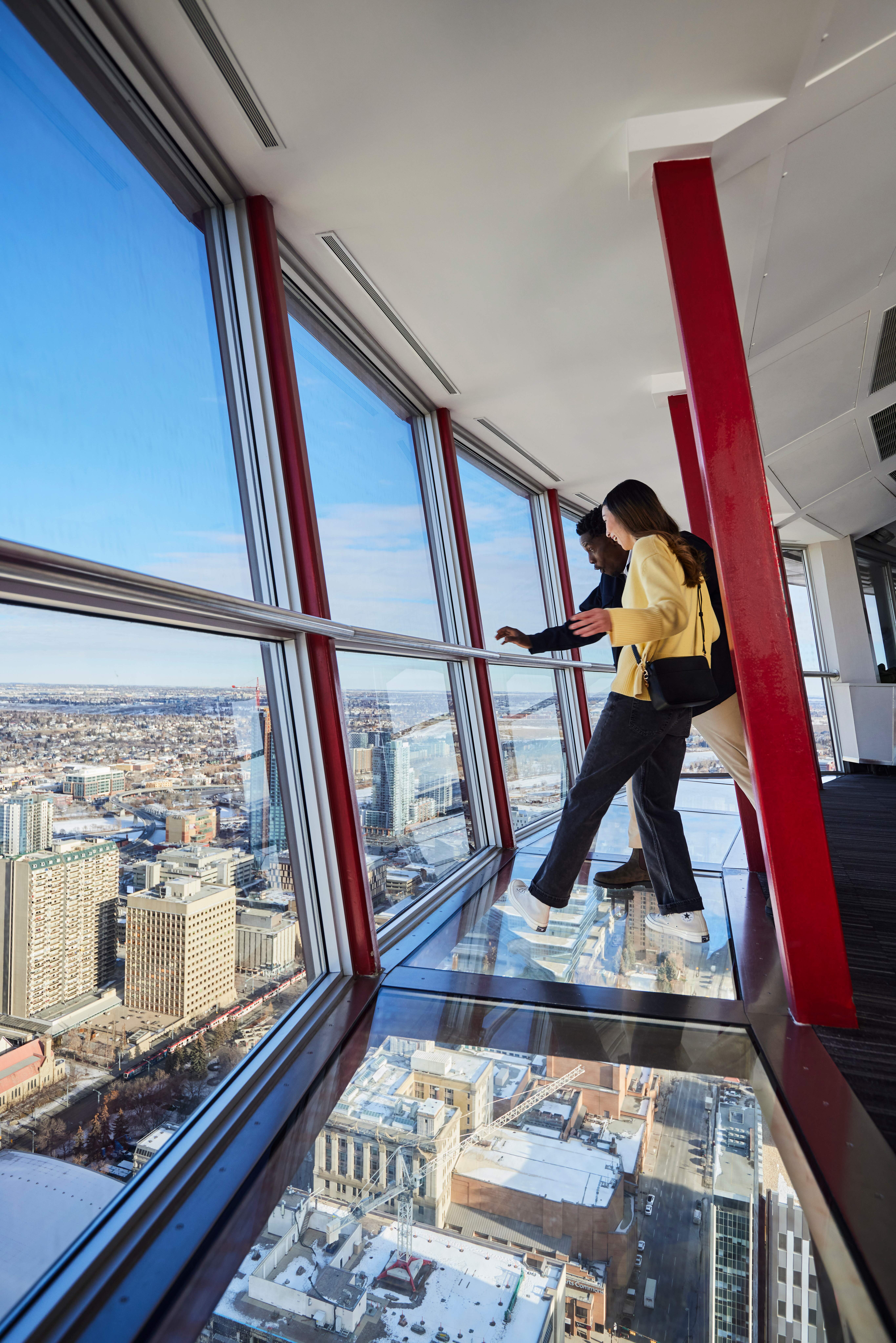 Two visitors admiring the view in Calgary Tower