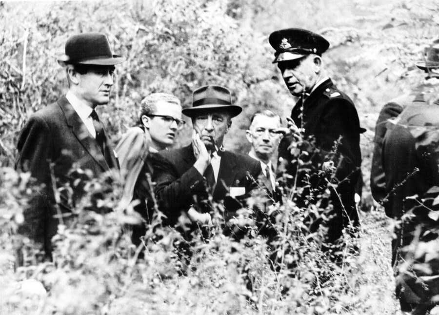 Coroner J.J. Loomes and investigating police at the Lane Cove River site
