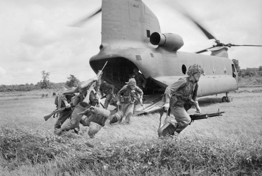 Troops from 6th Battalion, Royal Australian Regiment land by Chinook helicopter for a combat operation in South Vietnam