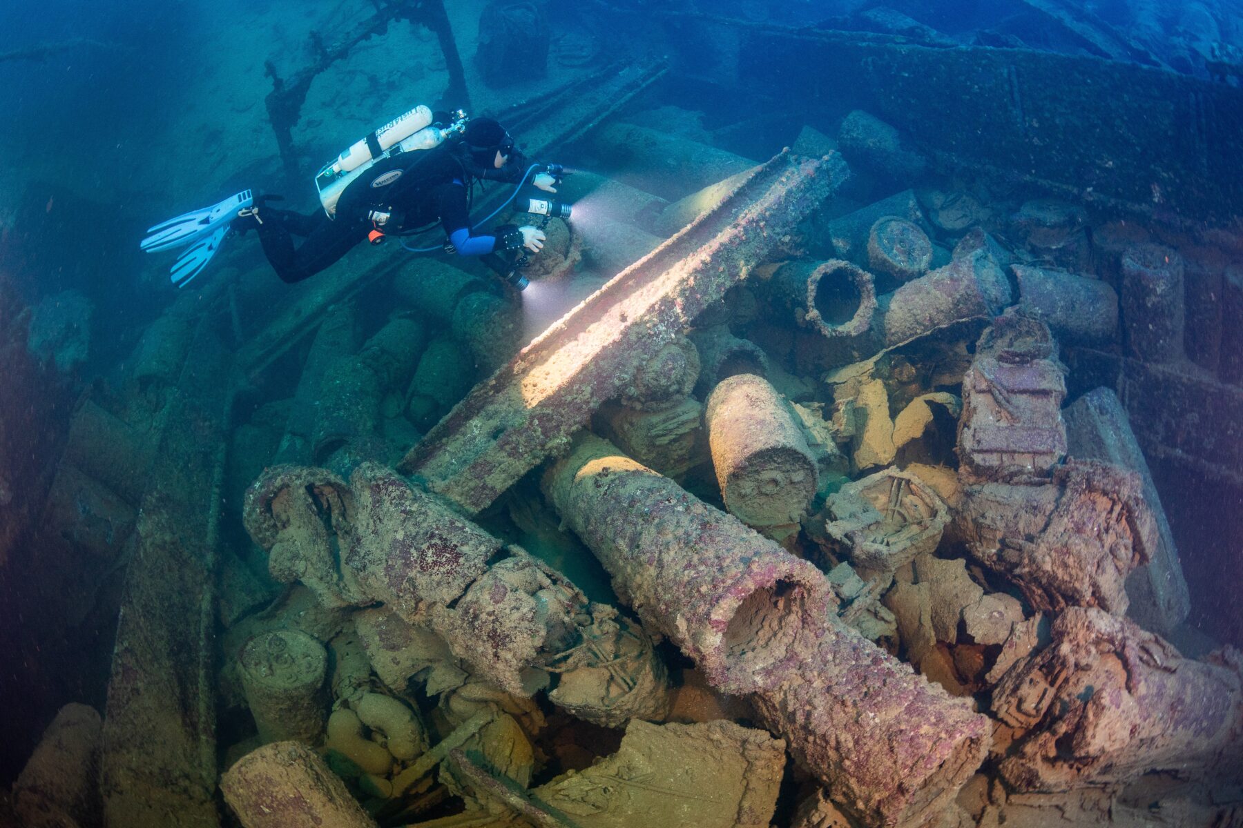 Torpedoes, depth charges and other munitions litter the cargo holds of the San Francisco Maru shipwreck