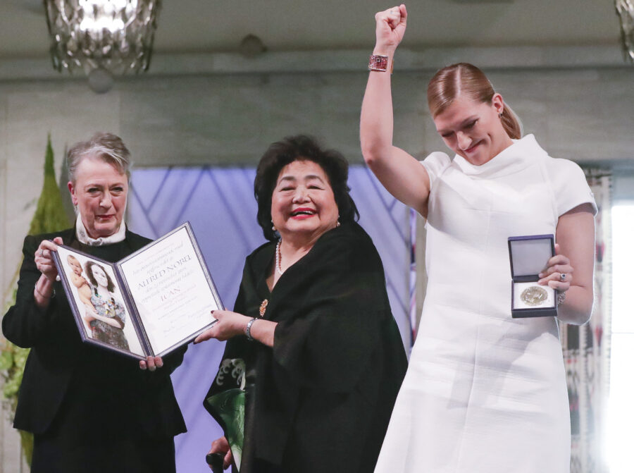 Berit Reiss-Andersen (L), chairperson of the Norwegian Nobel Committee, hands over the 2017 Nobel Peace Prize to Beatrice Fihn (R), leader of ICAN (International Campaign to Abolish Nuclear Weapons), and Hiroshima nuclear bombing survivor Setsuko Thurlow (C) during the award ceremony of the 2017 Nobel Peace Prize at the city hall in Oslo, Norway, on December 10, 2017