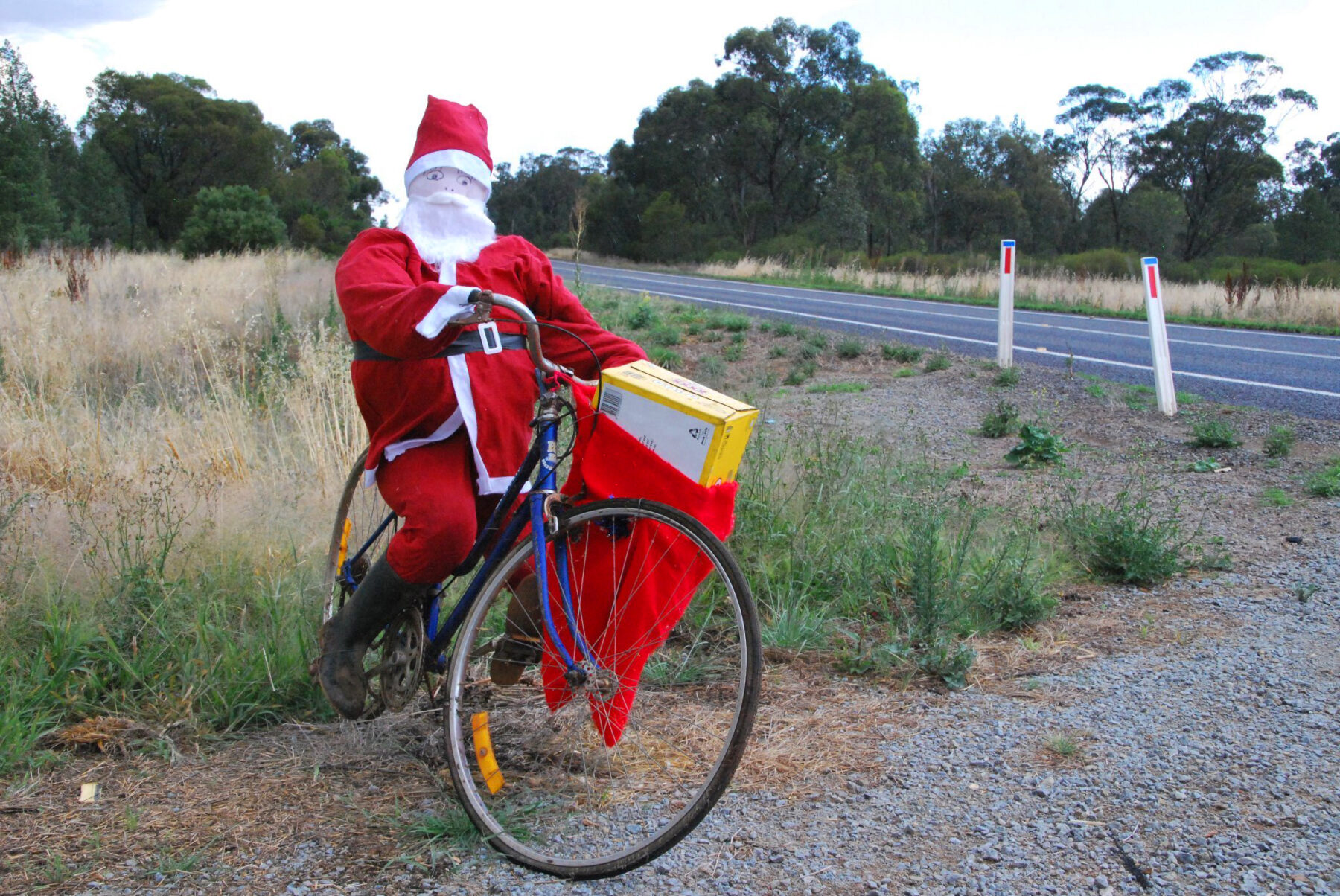 A santa decoration on a bicycle