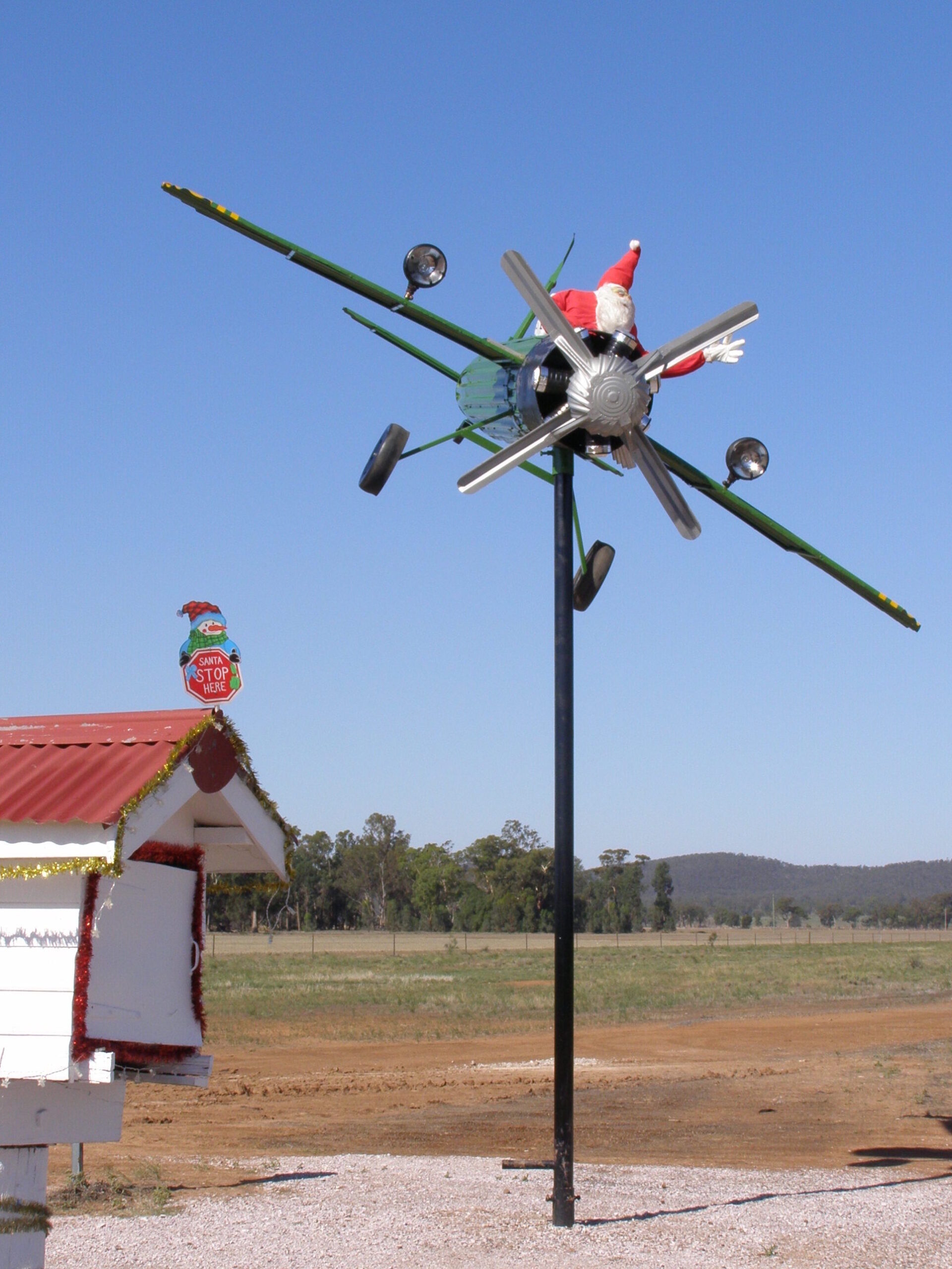 Farmyard decoration of a Santa in a plane