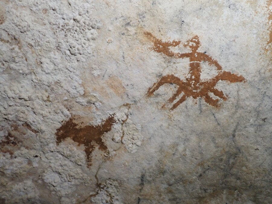 A 67,800 year old hand stencil, in a cave